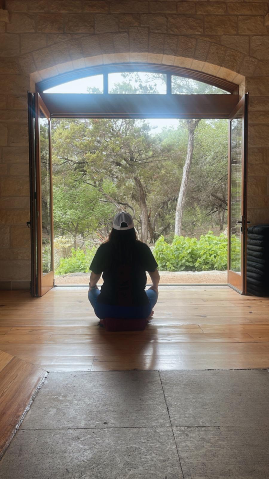 Regina sitting looking outside