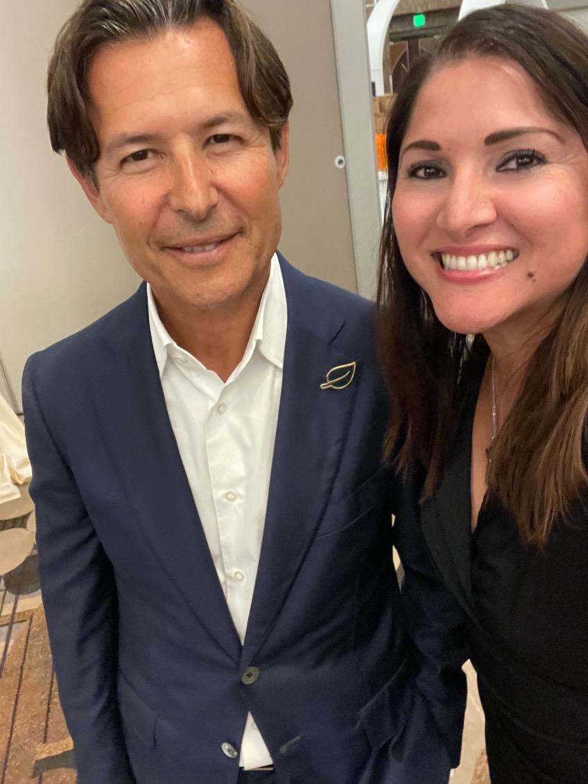 Regina posing with CEO