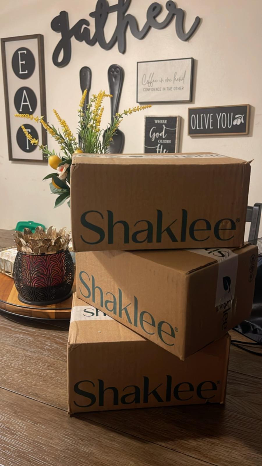 stack of Shaklee boxes